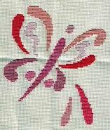 Cross stitch square for Poppy's quilt