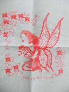 Cross stitch square for Poppy's quilt