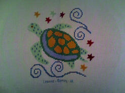 Cross stitch square for Lewis C 2's quilt