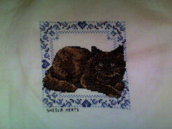 Cross stitch square for Lola's quilt