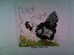 Cross stitch square for Lola's quilt
