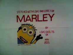 Cross stitch square for Marley V's quilt