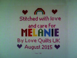 Cross stitch square for Melanie M's quilt