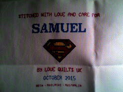 Cross stitch square for Samuel H's quilt