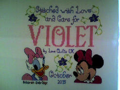 Cross stitch square for Violet C's quilt