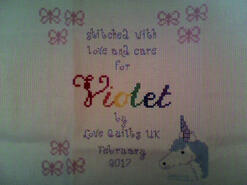 Cross stitch square for Violet G's quilt