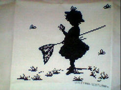 Cross stitch square for Violet G's quilt
