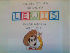 Cross stitch square for Lewis T's quilt