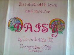 Cross stitch square for Daisy E's quilt