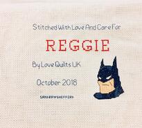 Cross stitch square for Reggie A's quilt