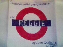 Cross stitch square for Reggie A's quilt