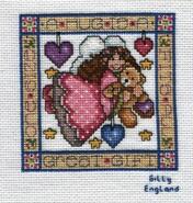 Cross stitch square for Ellie B's quilt