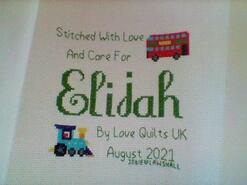 Cross stitch square for Elijah W's quilt