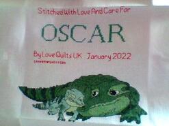 Cross stitch square for Oscar B's quilt