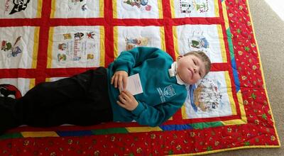 Photo of Johnathon Ls quilt