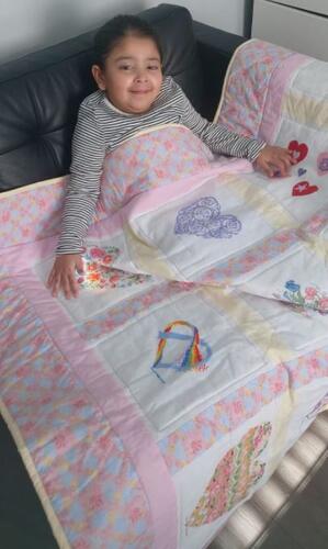 Photo of Amana Js quilt
