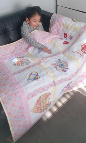 Photo of Amana Js quilt
