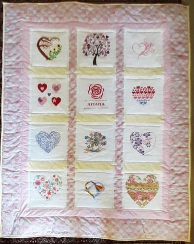 Photo of Amana Js quilt