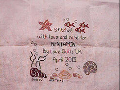 Cross stitch square for Benjamin H's quilt