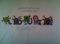 Cross stitch square for Louie B's quilt
