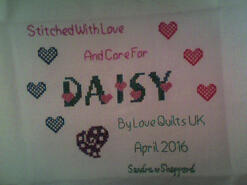 Cross stitch square for Daisy A's quilt