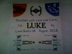 Cross stitch square for Luke S's quilt