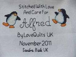 Cross stitch square for Alfred O's quilt