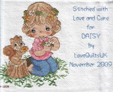 Cross stitch square for Daisy's quilt