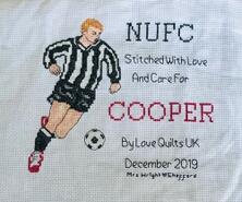 Cross stitch square for Cooper R's quilt