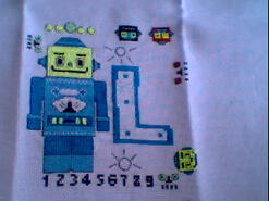 Cross stitch square for Leon's quilt