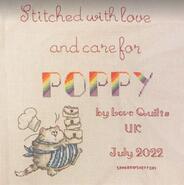 Cross stitch square for Poppy W's quilt