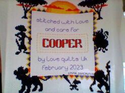Cross stitch square for Cooper's quilt