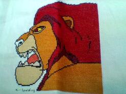 Cross stitch square for Cooper's quilt