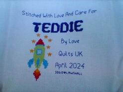 Cross stitch square for Teddie K's quilt