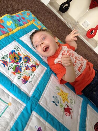 Photo of Travis Gs quilt