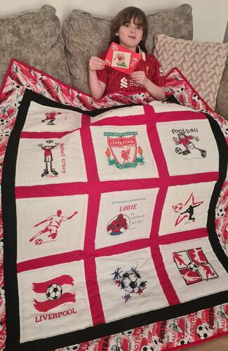 Photo of Louie Js quilt