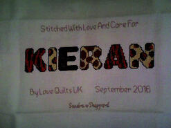 Cross stitch square for Kieran's quilt