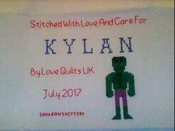 Cross stitch square for Kylan J's quilt