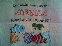 Cross stitch square for Aurelia S's quilt