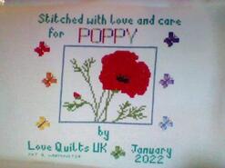 Cross stitch square for Poppy E's quilt